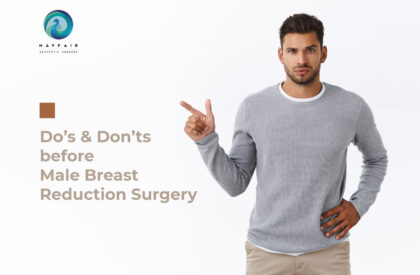 A guy standing checkin the best male breast reduction surgery details